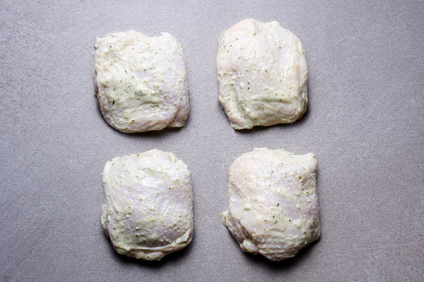 Garlic, Rosemary and Lemon Marinated Boneless Skin On Chicken Thighs | HG Walter Ltd